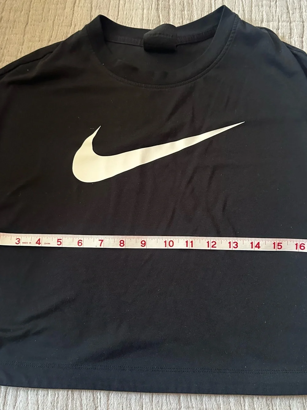 Nike Black T-Shirt with White Swoosh Logo